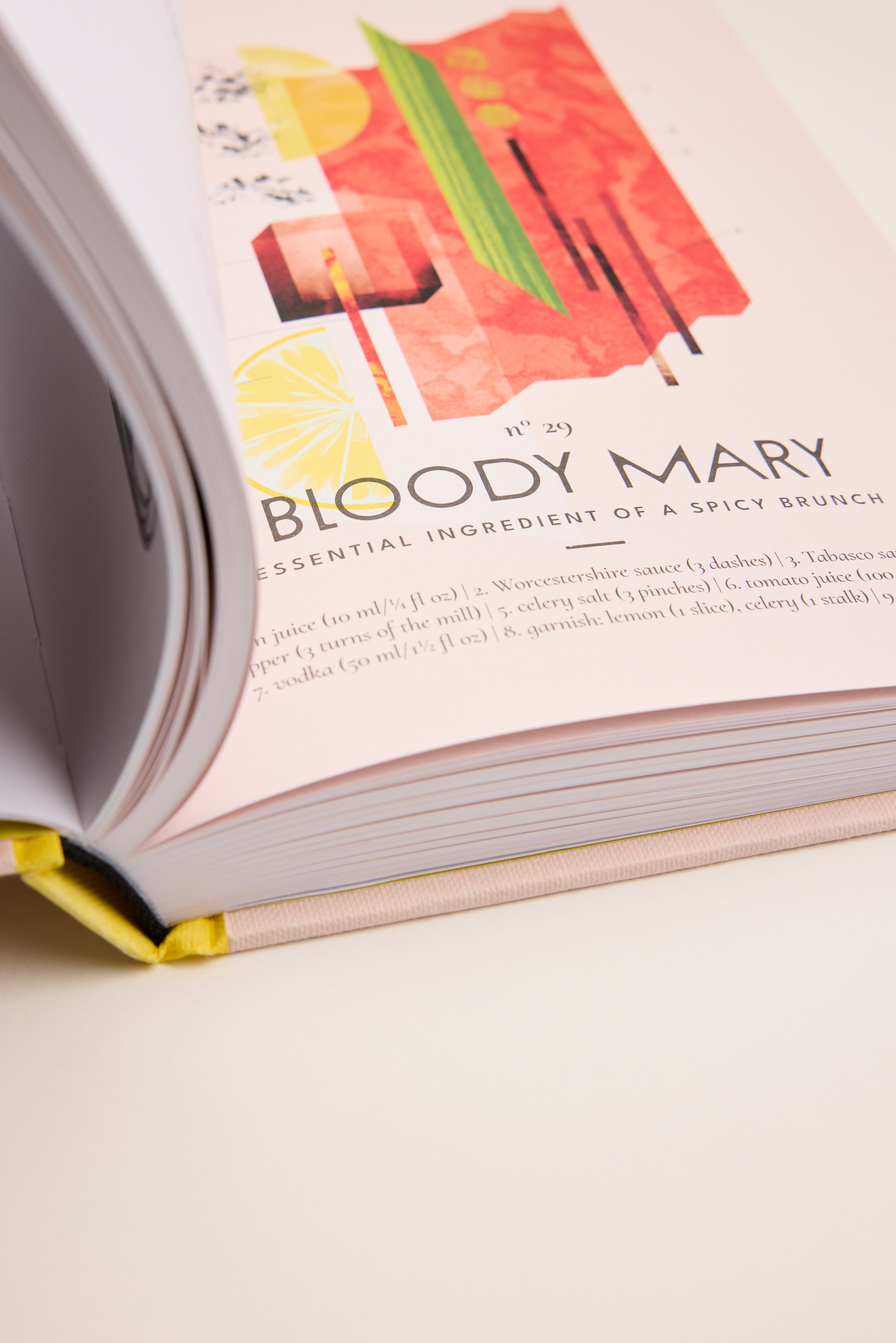 The Cult Cocktails Book by Other features a close-up of an open page with a vivid Bloody Mary illustration and ingredients. Ideal for home bartenders, it boasts a yellow spine and thick pages for durability.
