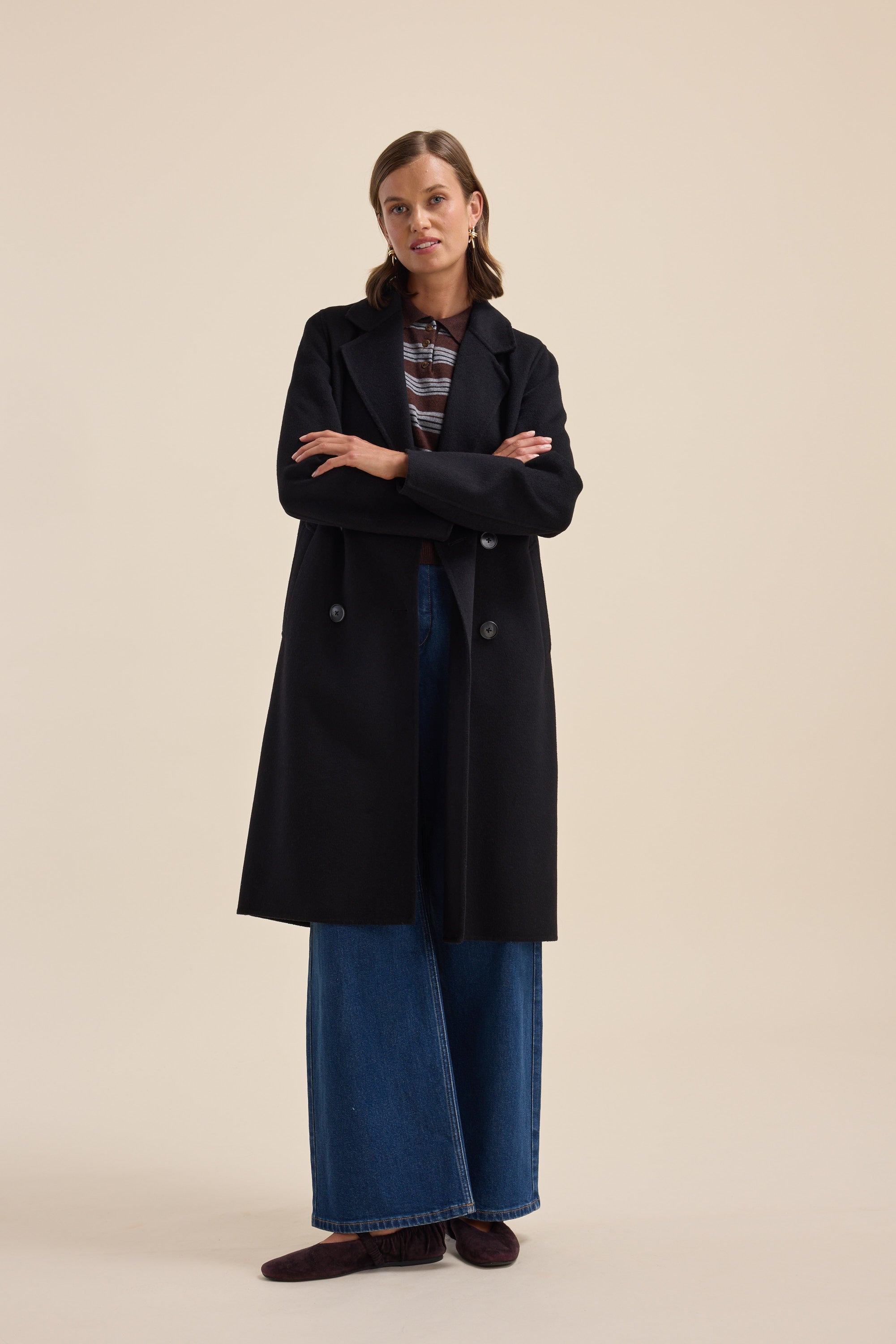 Max’s The Belted Wool Coat styled with a striped top and wide-leg jeans—timeless staples.