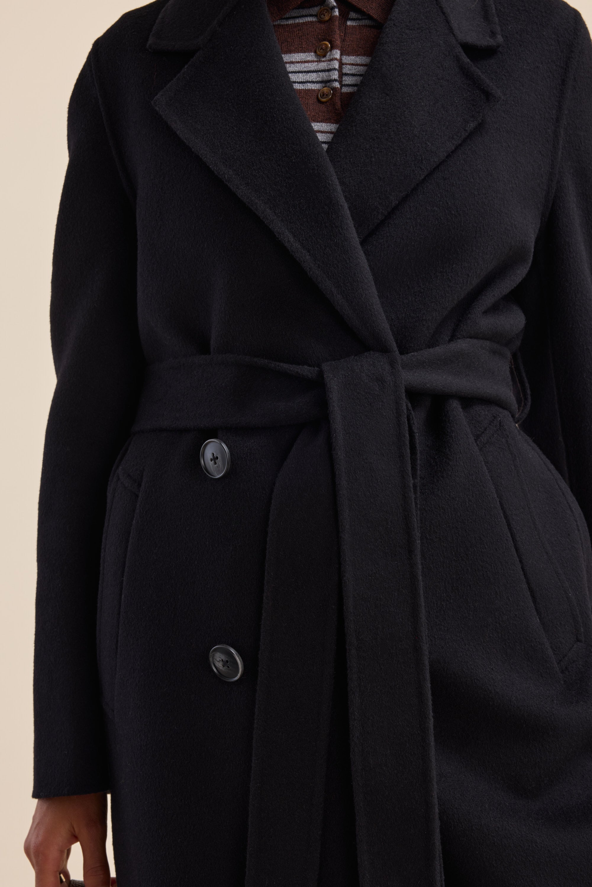 Model in Max’s The Belted Wool Coat over a striped shirt, shown shoulders to thighs.
