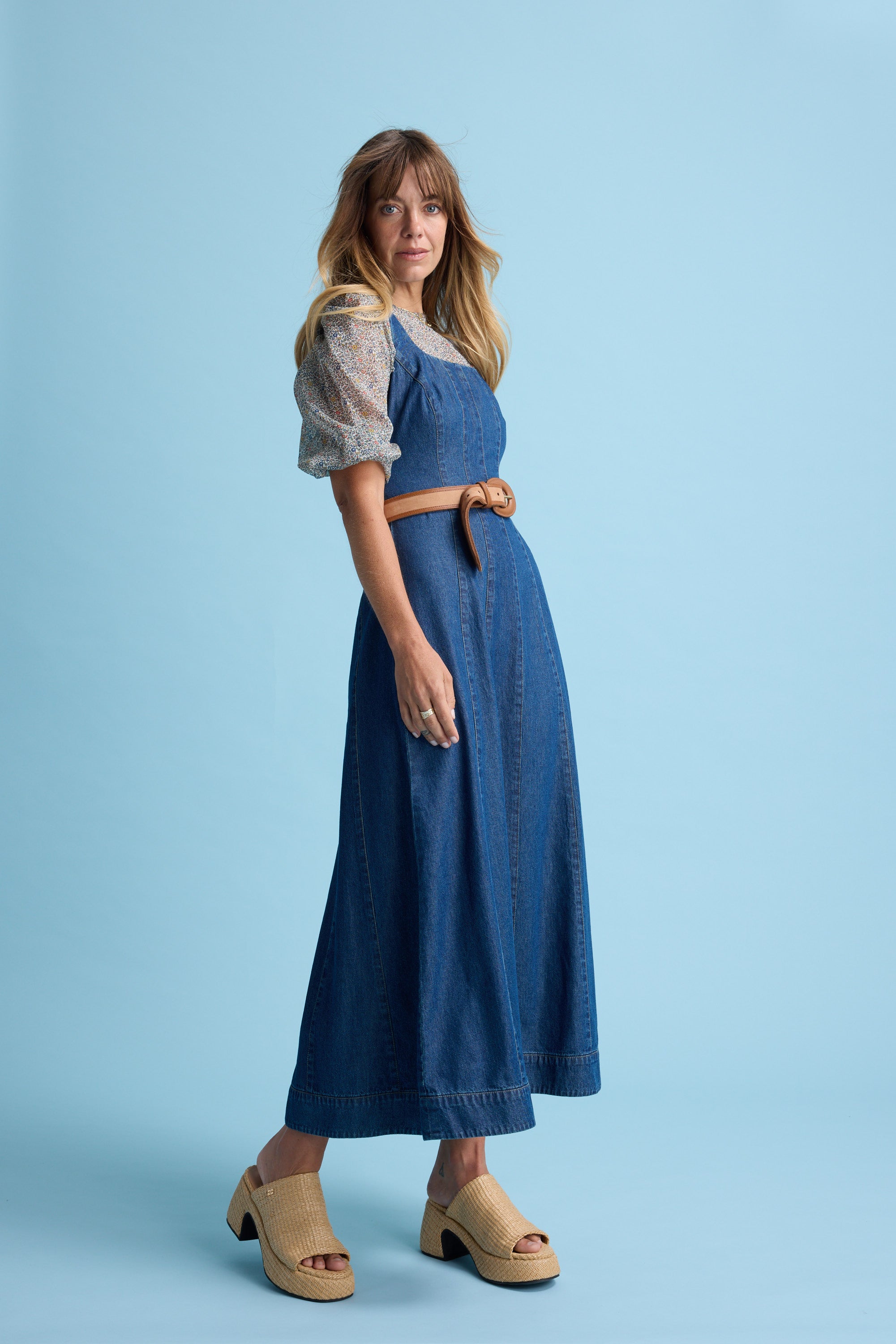Woman in a denim dress and platform sandals pairs with Max Eloise Puff Sleeve Blouse.