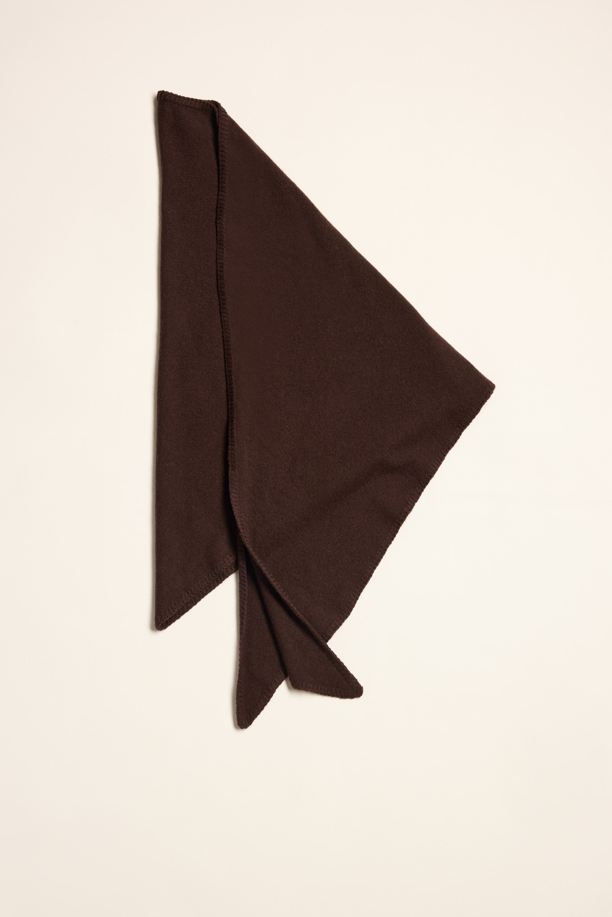 Max Dagmar Cashmere Blend Triangle Scarf offers lightweight warmth on a light background.