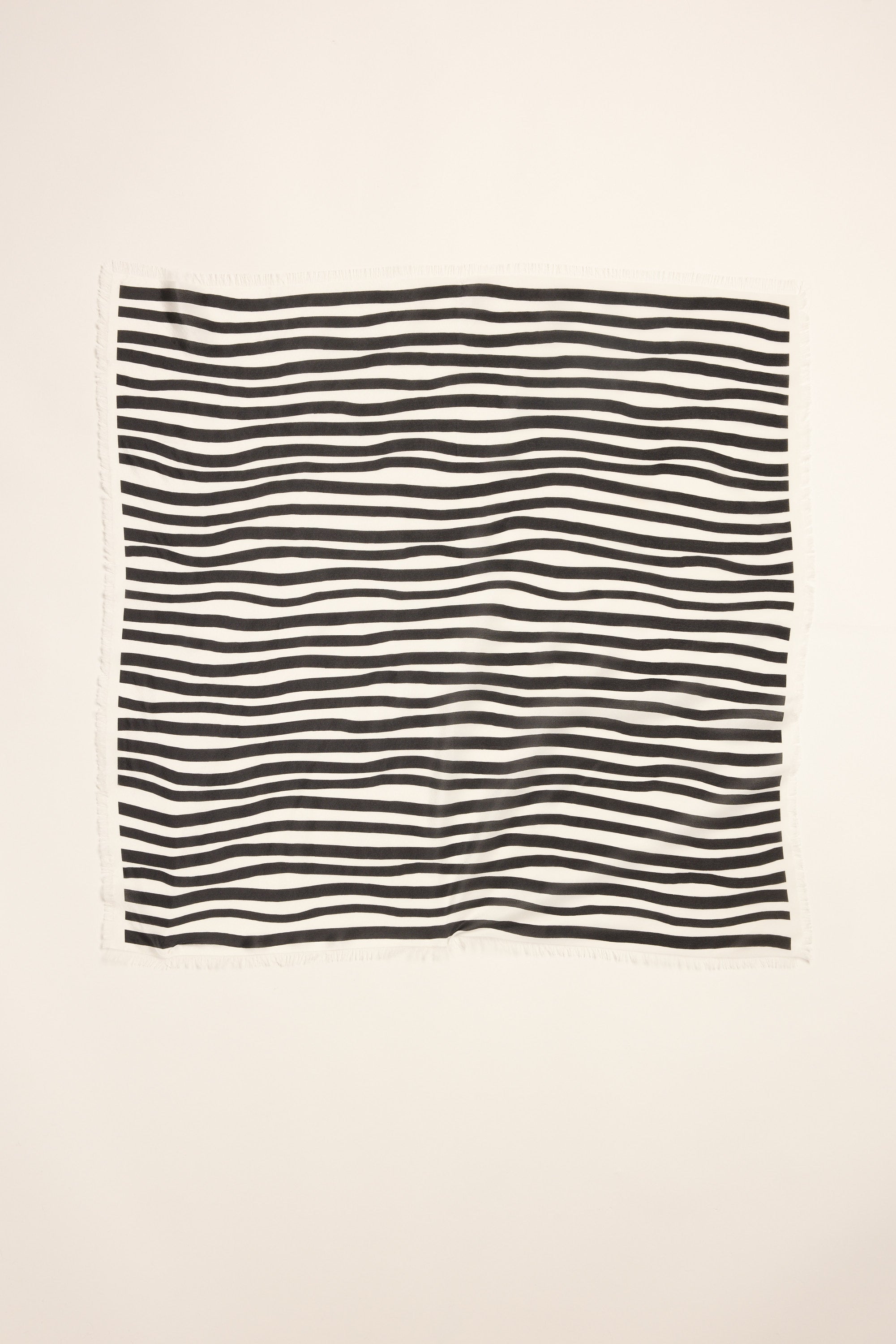 Max Mable Frayed Edge Silk Scarf: white silk with black stripes and subtle frayed edges.