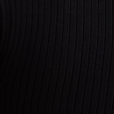 Close-up of black ribbed NZ fabric with vertical textured lines.