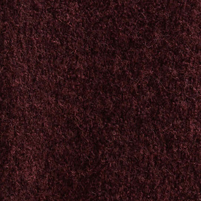 Close-up of textured, dark brown NZ wool fabric.