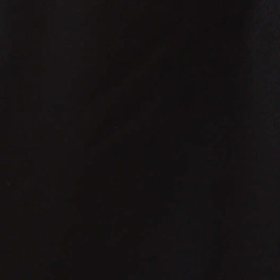 Solid black NZ surface with very subtle texture and shadows.