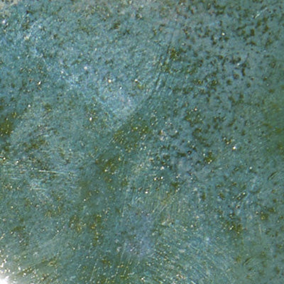 Close-up of a textured NZ green-blue surface with subtle specks and color variations.